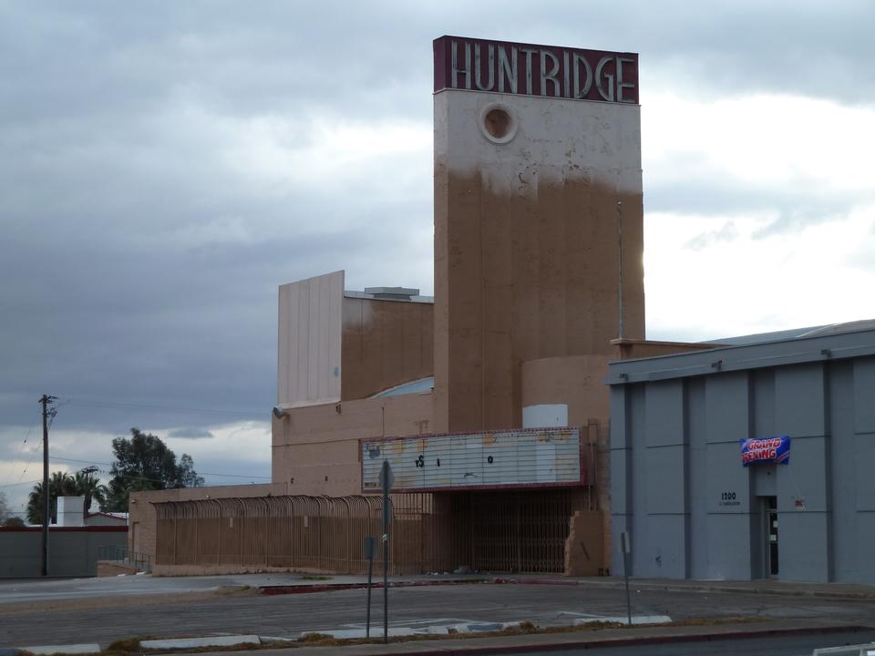 The Huntridge Theater tower and marquee under a cloudy sky